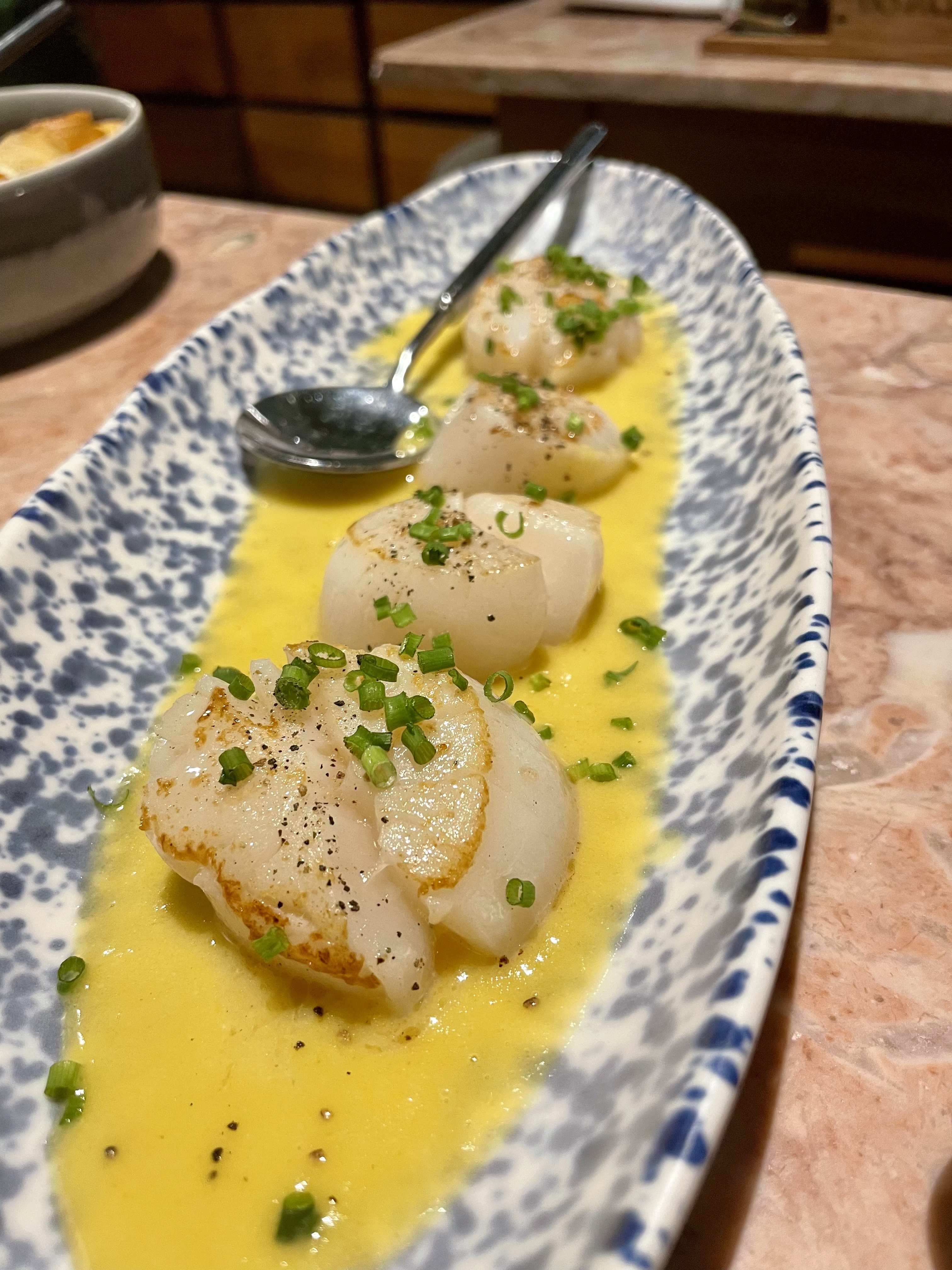 Grilled scallops with passion fruit emulsion