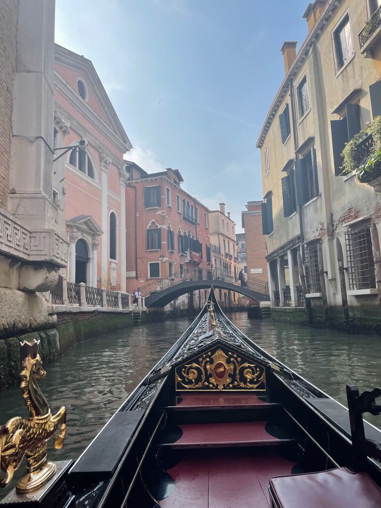 Traveling Down A Canal Via Gondola