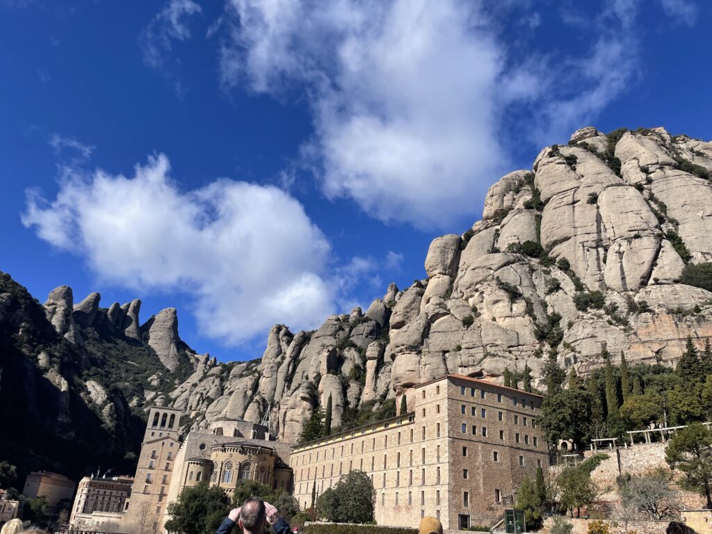 Looking up at the monastery and mountains