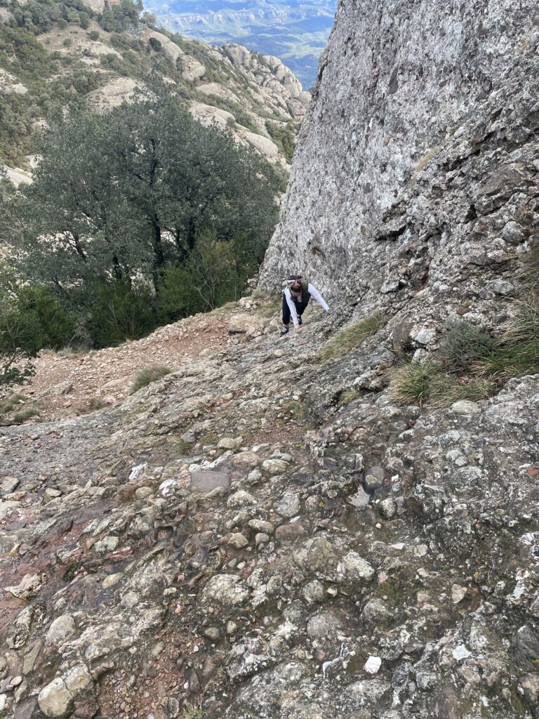 Climbing up the side of a rock